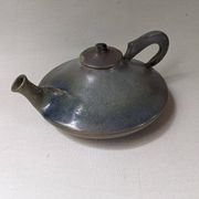 Ceramic teapot, artisanal, Japandi countryside decoration.