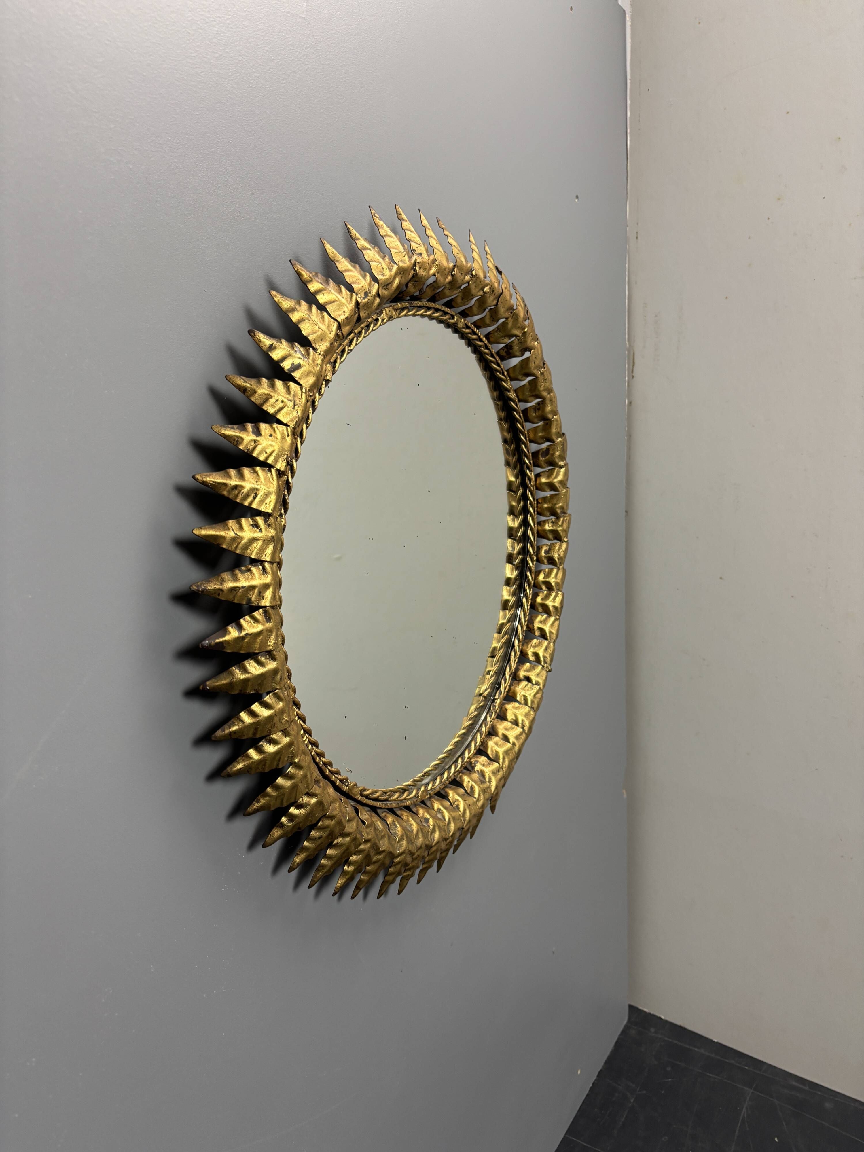 Midcentury bohemian Hollywood Regency Spanish gilt metal sun mirror, 1960s