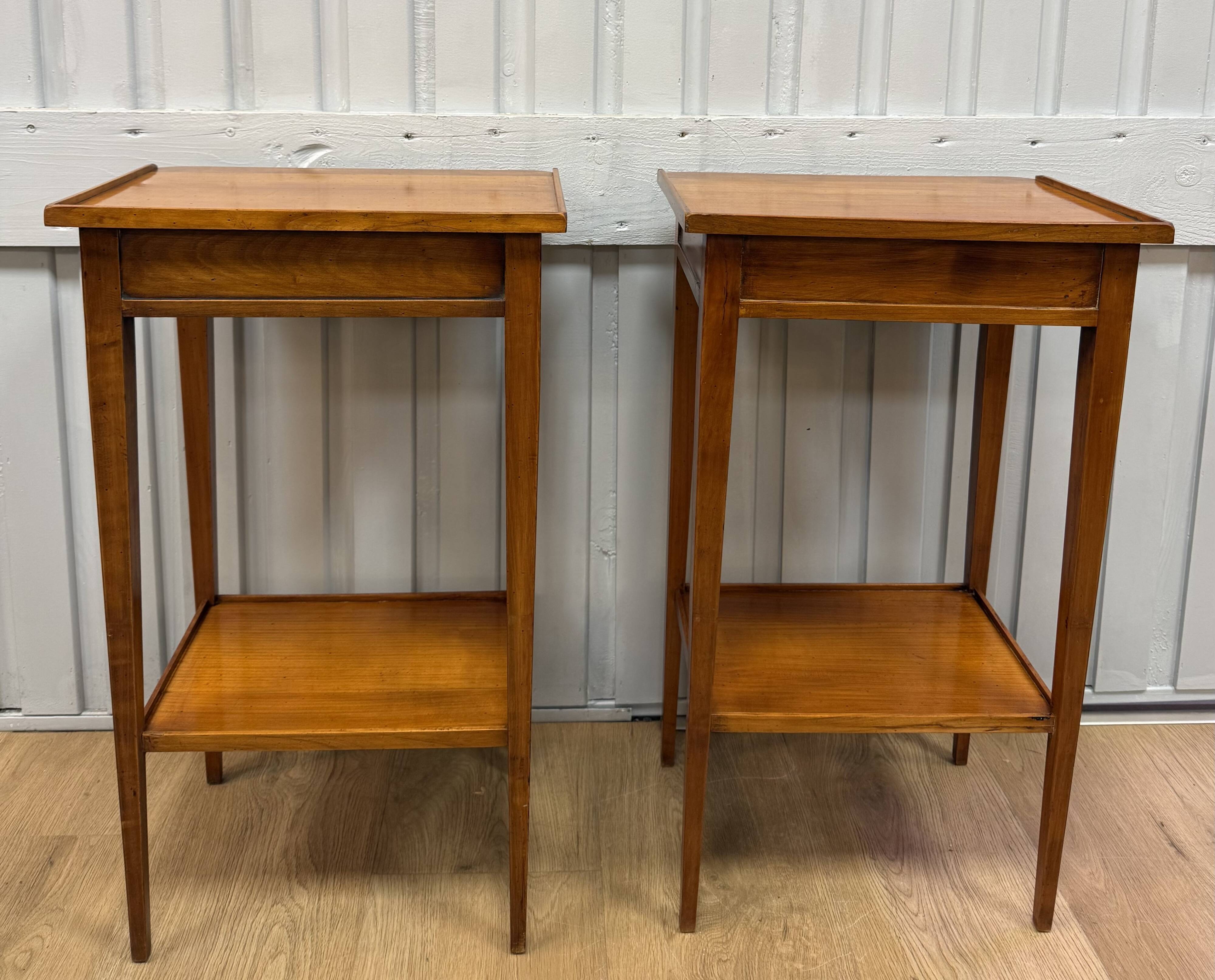 Pair of small side tables in cherry wood.