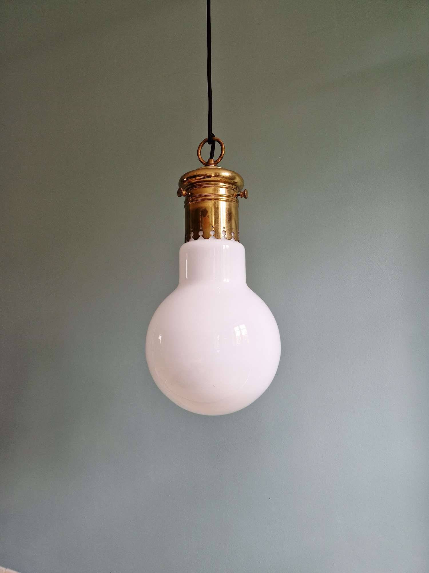 Large bulbous pendant light in white opaline and brass