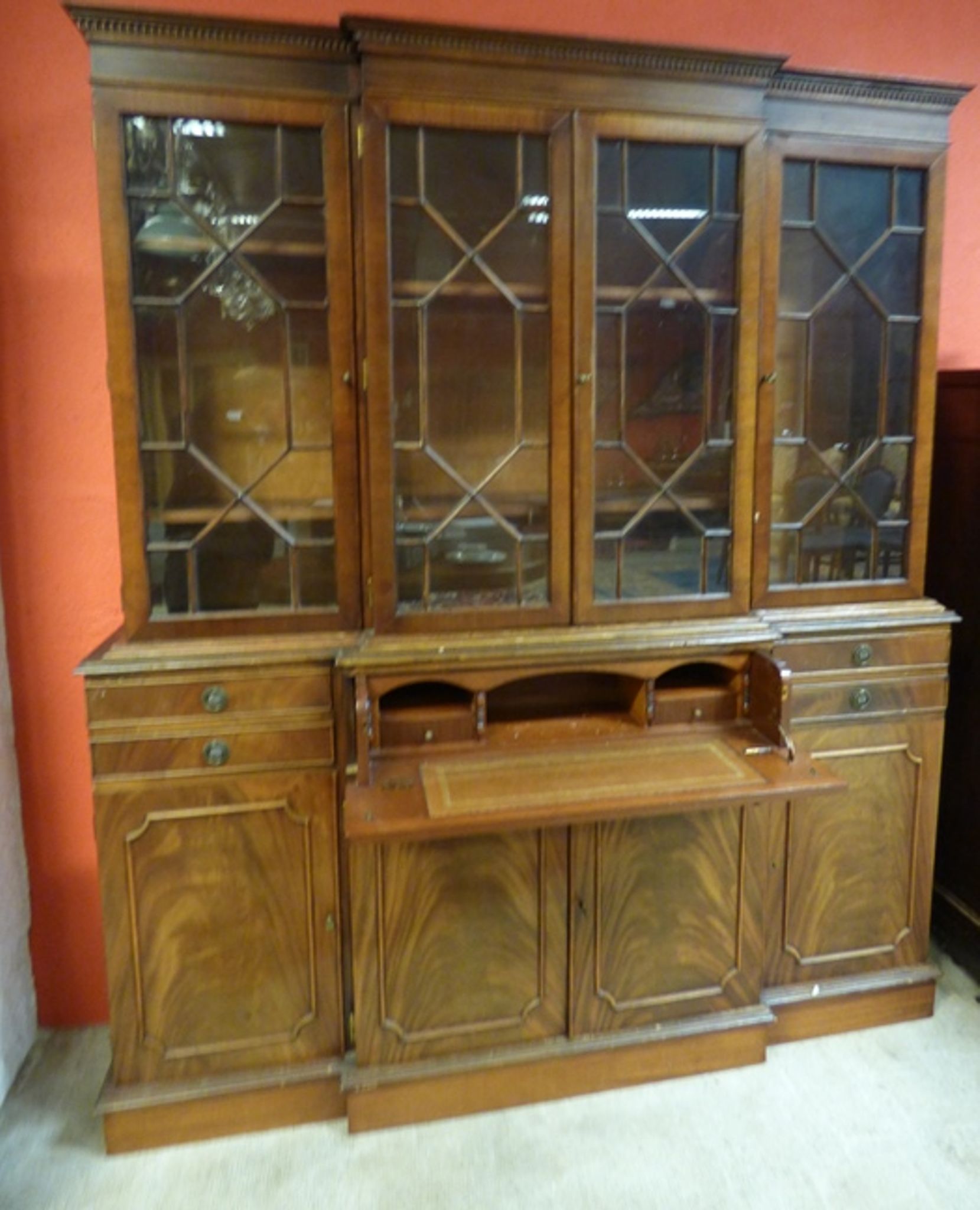 Scribanne bookcase in mahogany veneer English work of the twentieth century