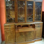 Scribanne bookcase in mahogany veneer English work of the twentieth century