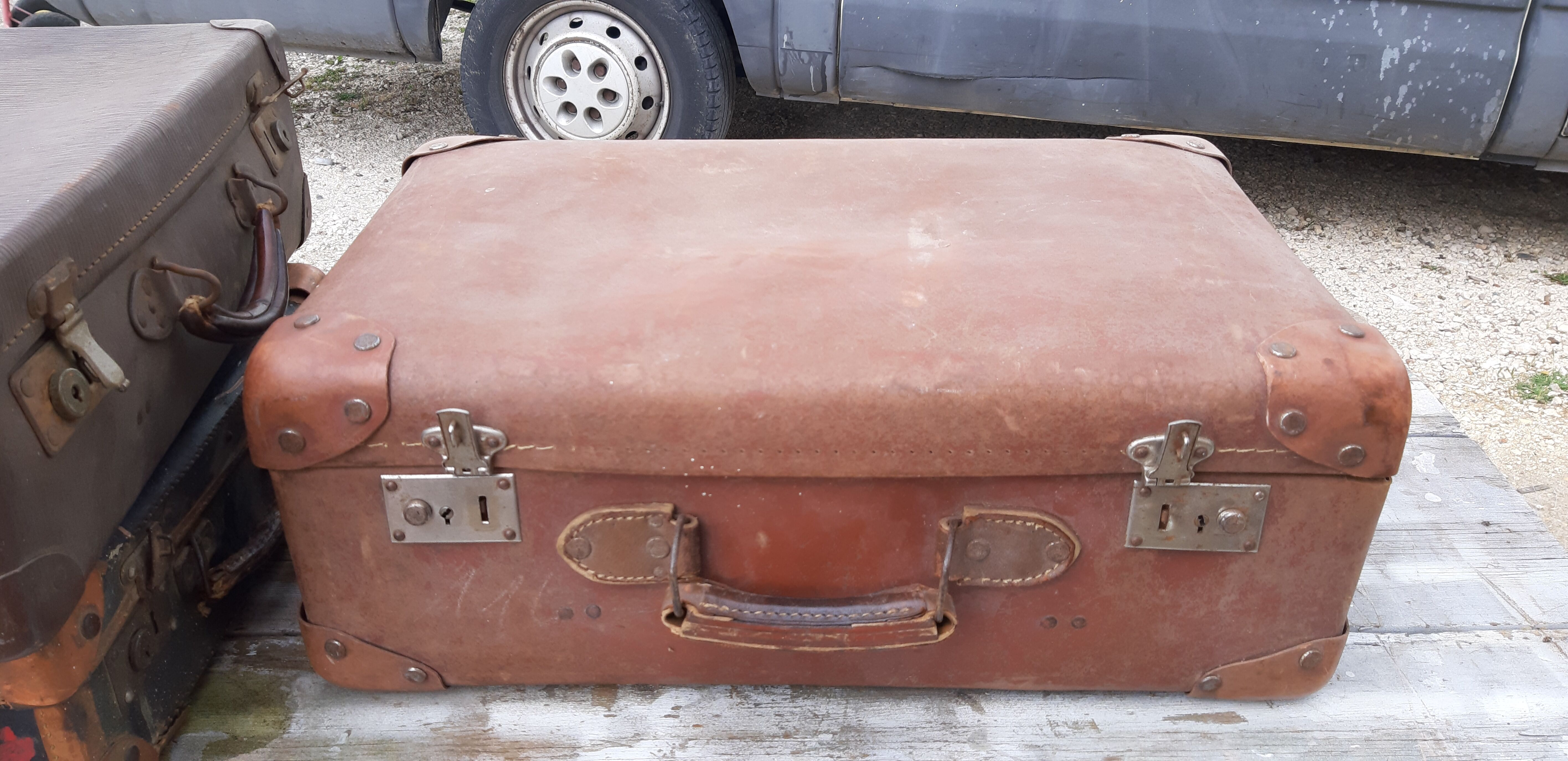 3 vintage suitcases