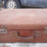 3 vintage suitcases