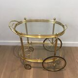 Oval brass trolley from Maison Baguès.