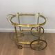 Oval brass trolley from Maison Baguès.