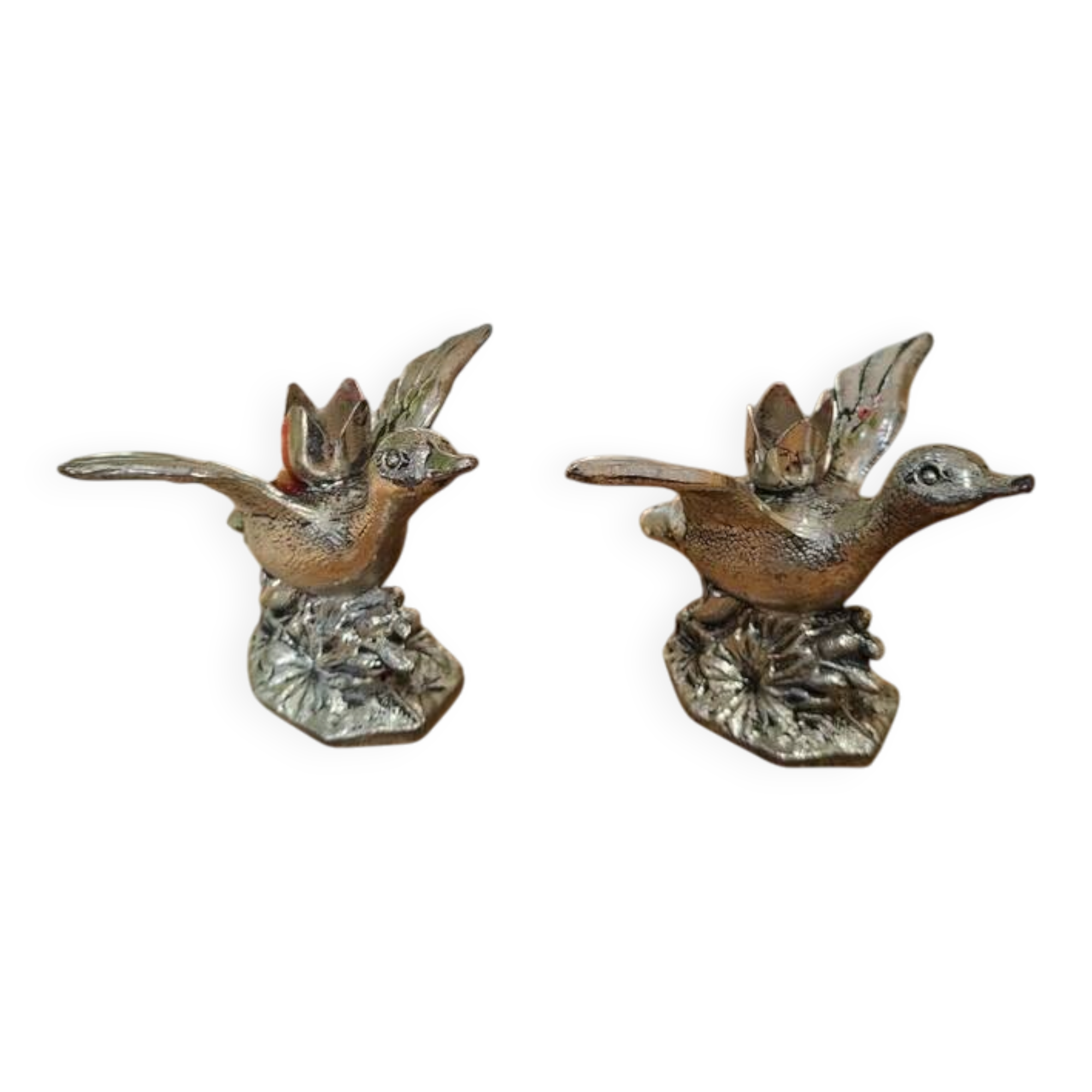 Set of two vintage silver-plated candle holders.