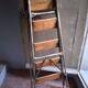 Vintage iron and wood stepladder with 5 steps