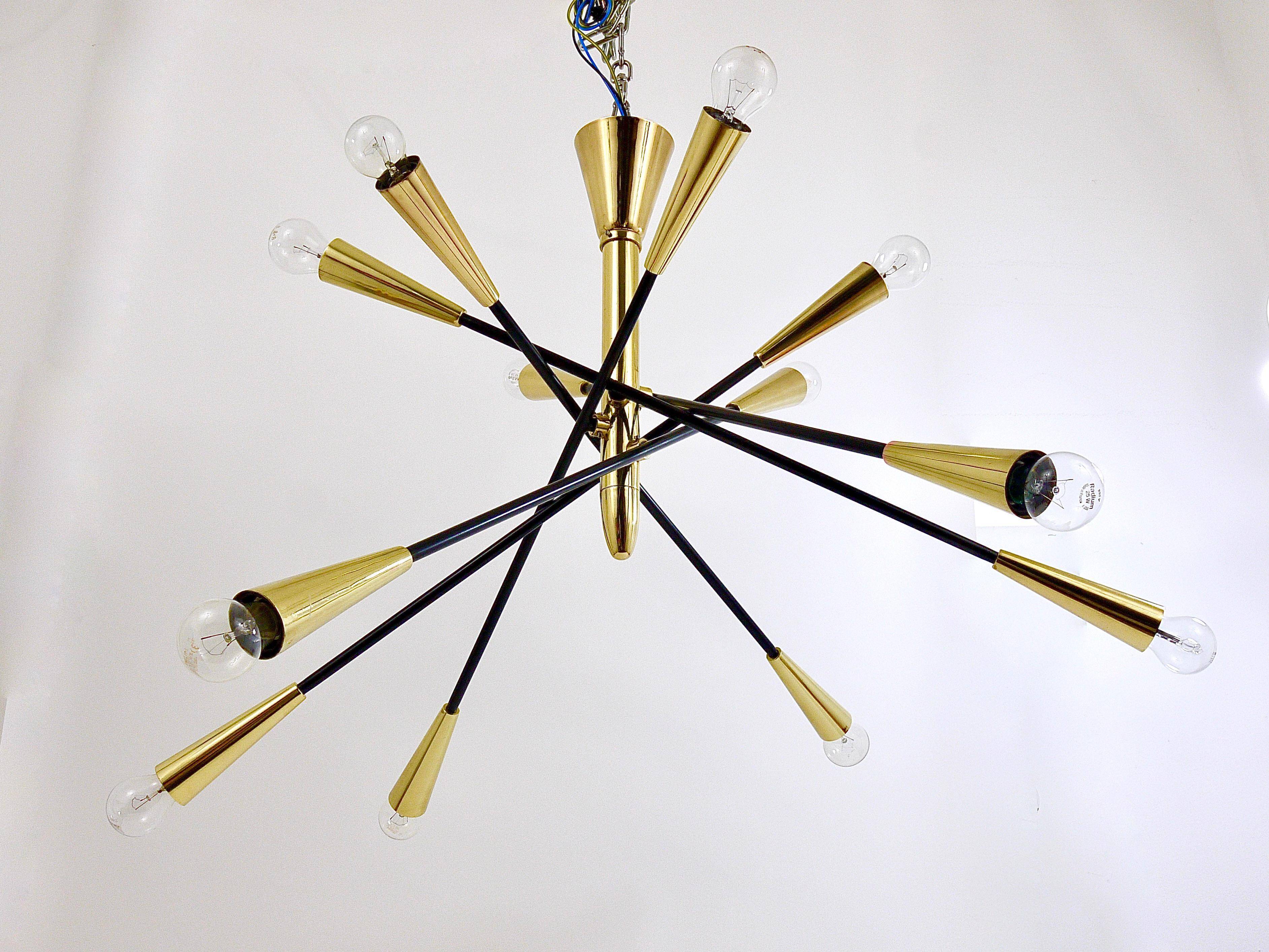 Black and brass articulated Sputnik chandelier in Stilnovo style, Italy, 1950.