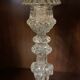 pair of cut glass candlesticks with lion and ram head decor, late 19th century