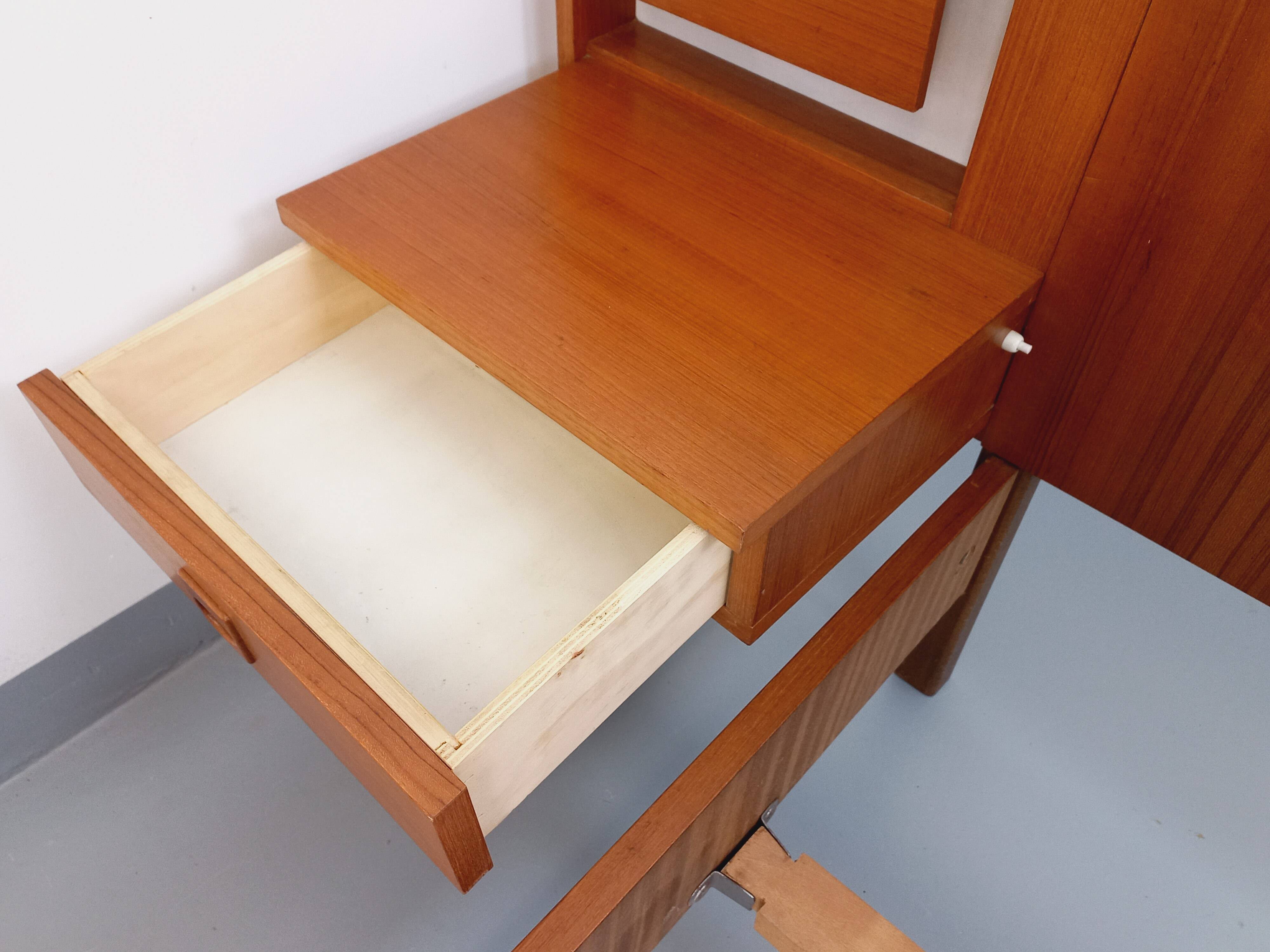 Vintage Scandinavian style double bed in teak from the 60s with integrated bedside lights