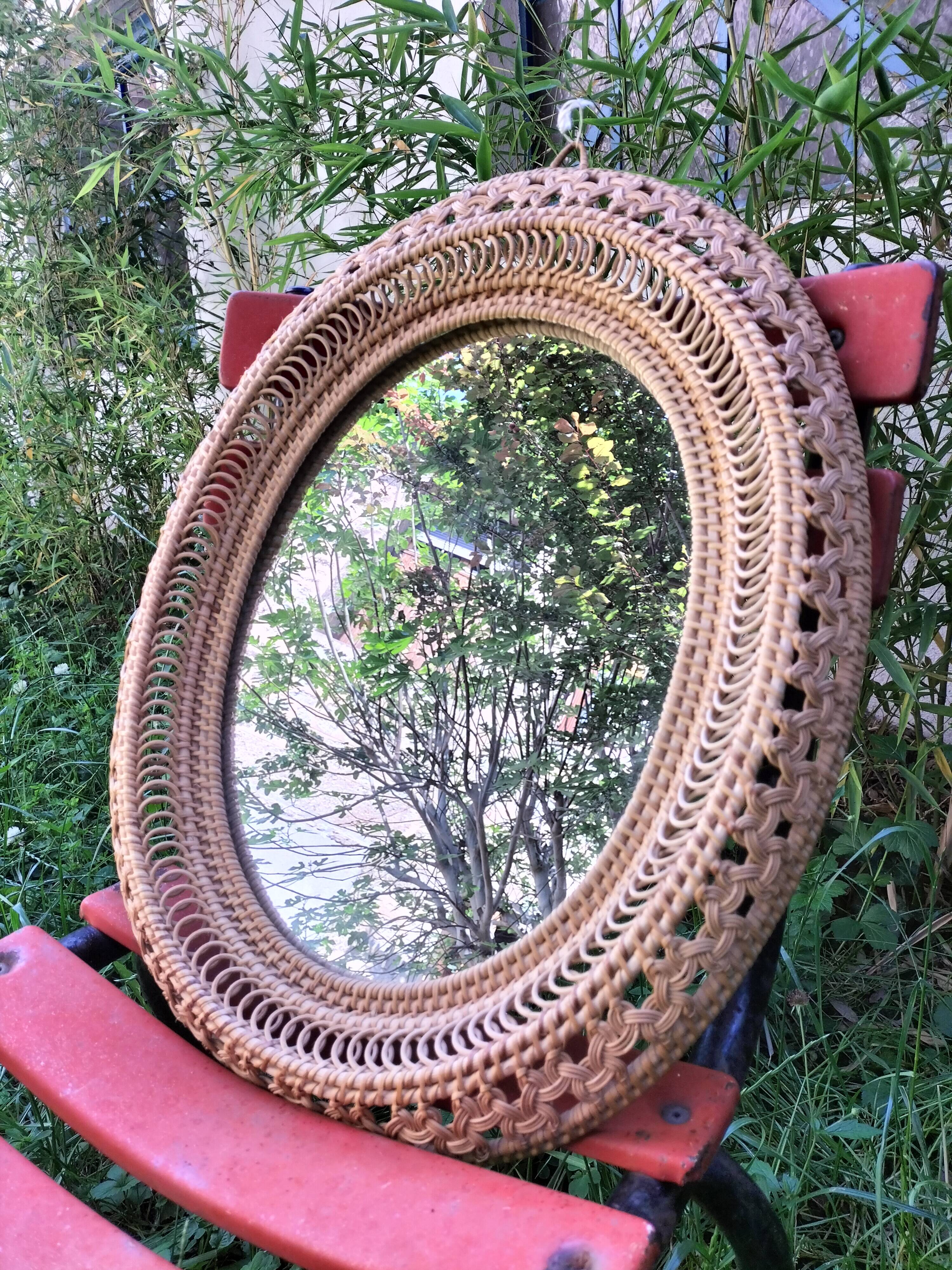 Oval rattan mirror