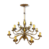 Golden luster with 12 arms of light decorated with leaves 1940