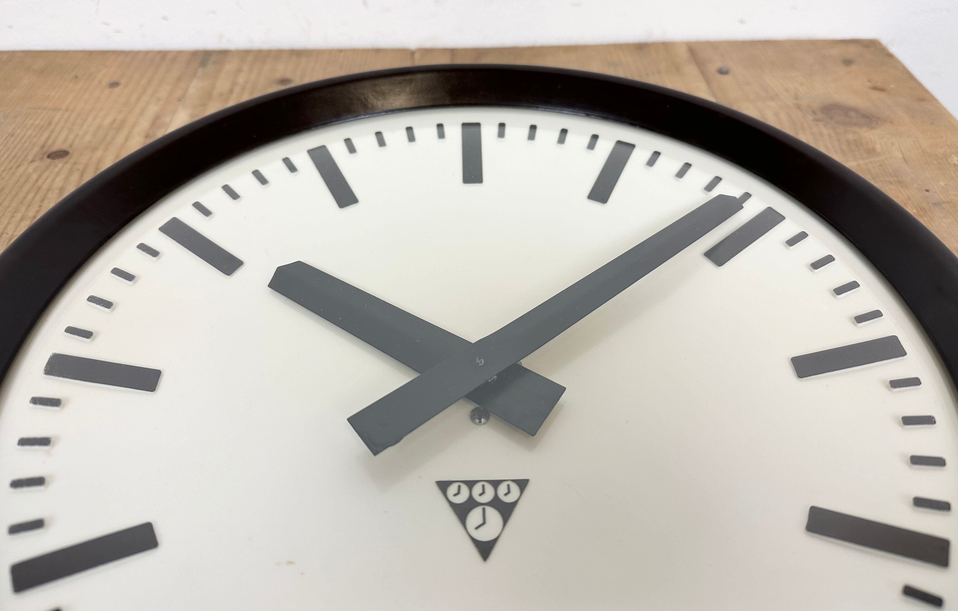 Industrial bakelite factory wall clock from Pragotron, 1960s