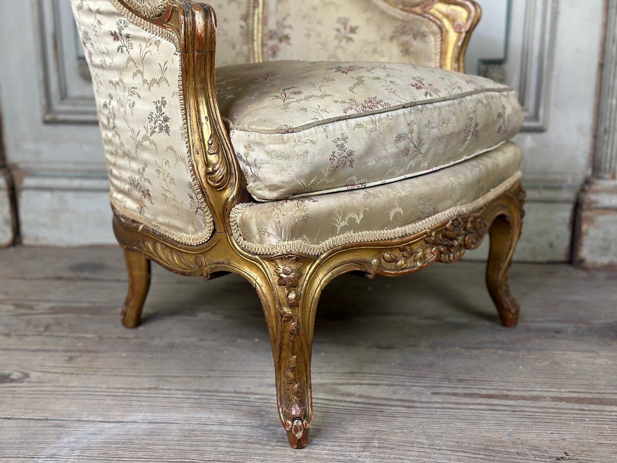 A Louis XV style child's bergère chair in carved and gilded wood, circa 1880