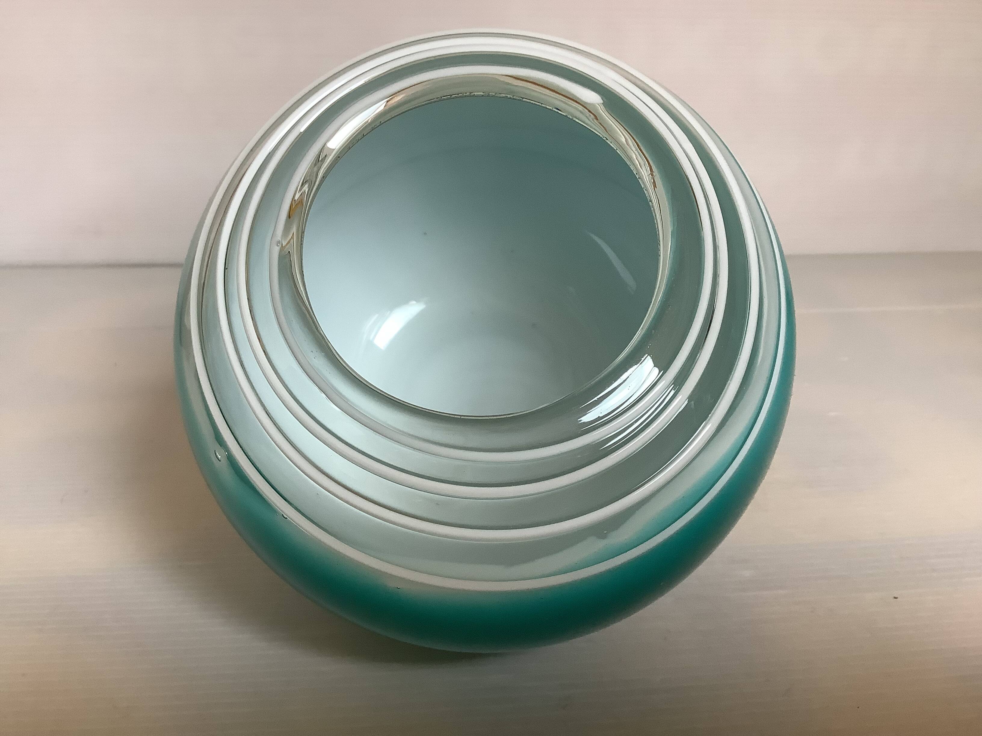 Small turquoise blue Murano style vase