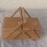 Sewing box in old varnished wood