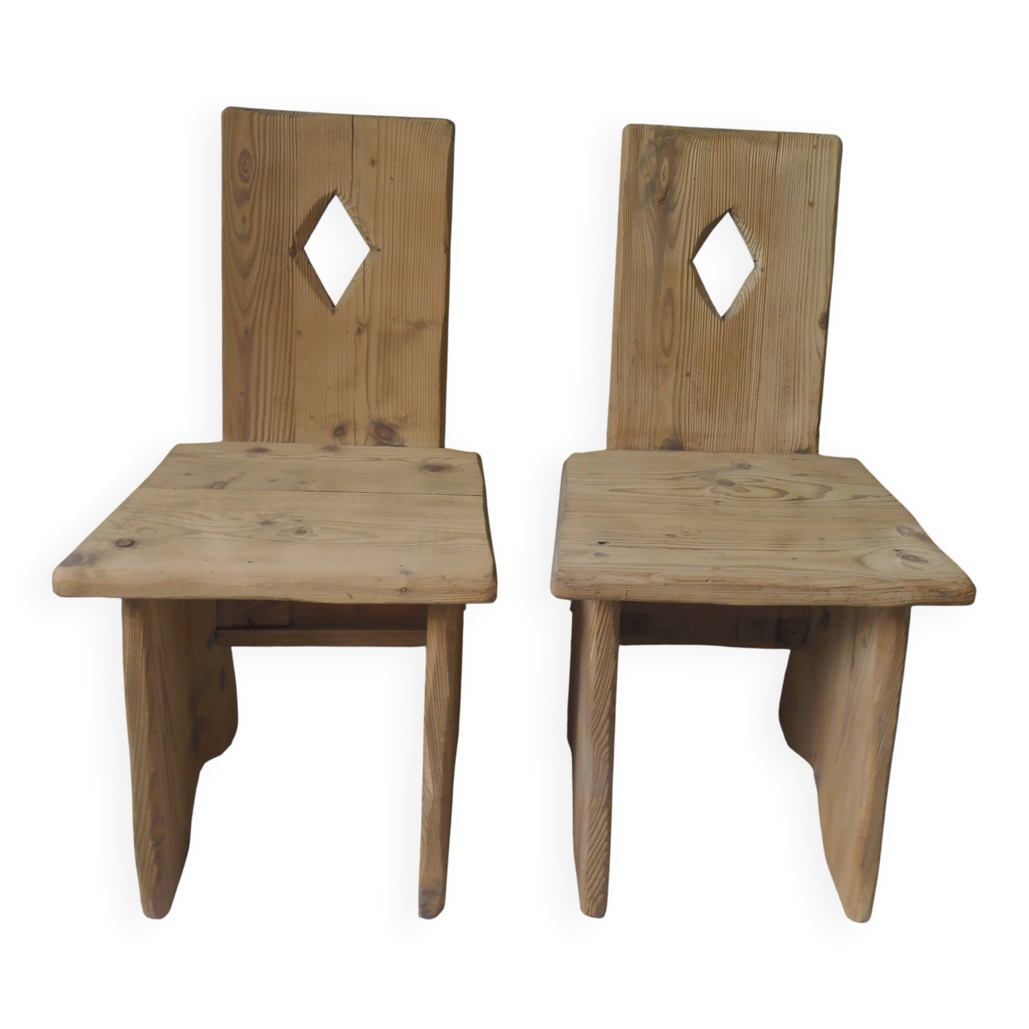 2 vintage chairs in brutalist style made of pitch pine with a waxed finish.