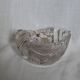 Shell-shaped crystal paperweight.