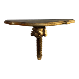 Wooden wall console and antique gilded stucco