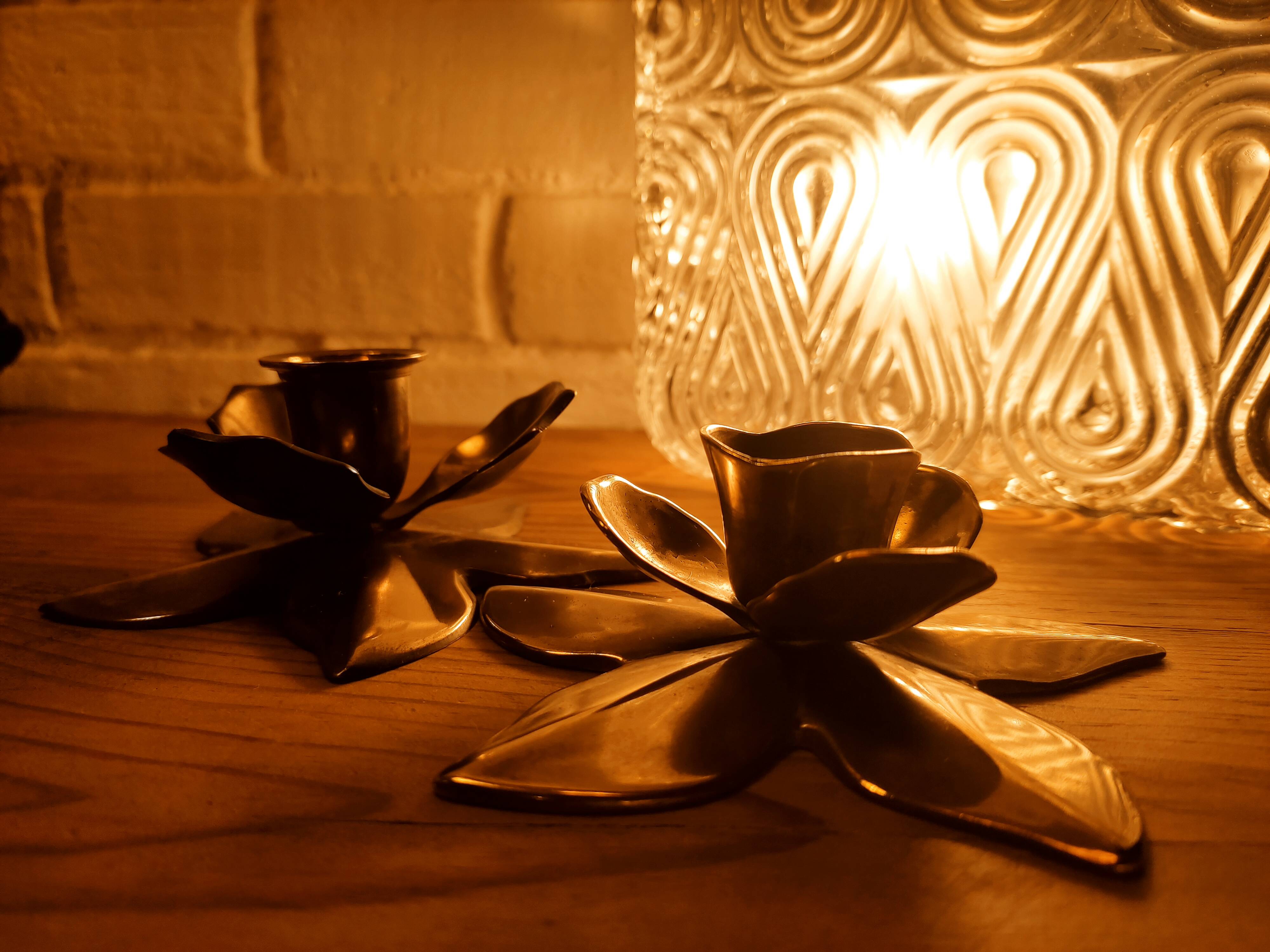 Duo of brass star candle holders