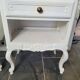 Pair of white patinated Louis XV style bedside tables