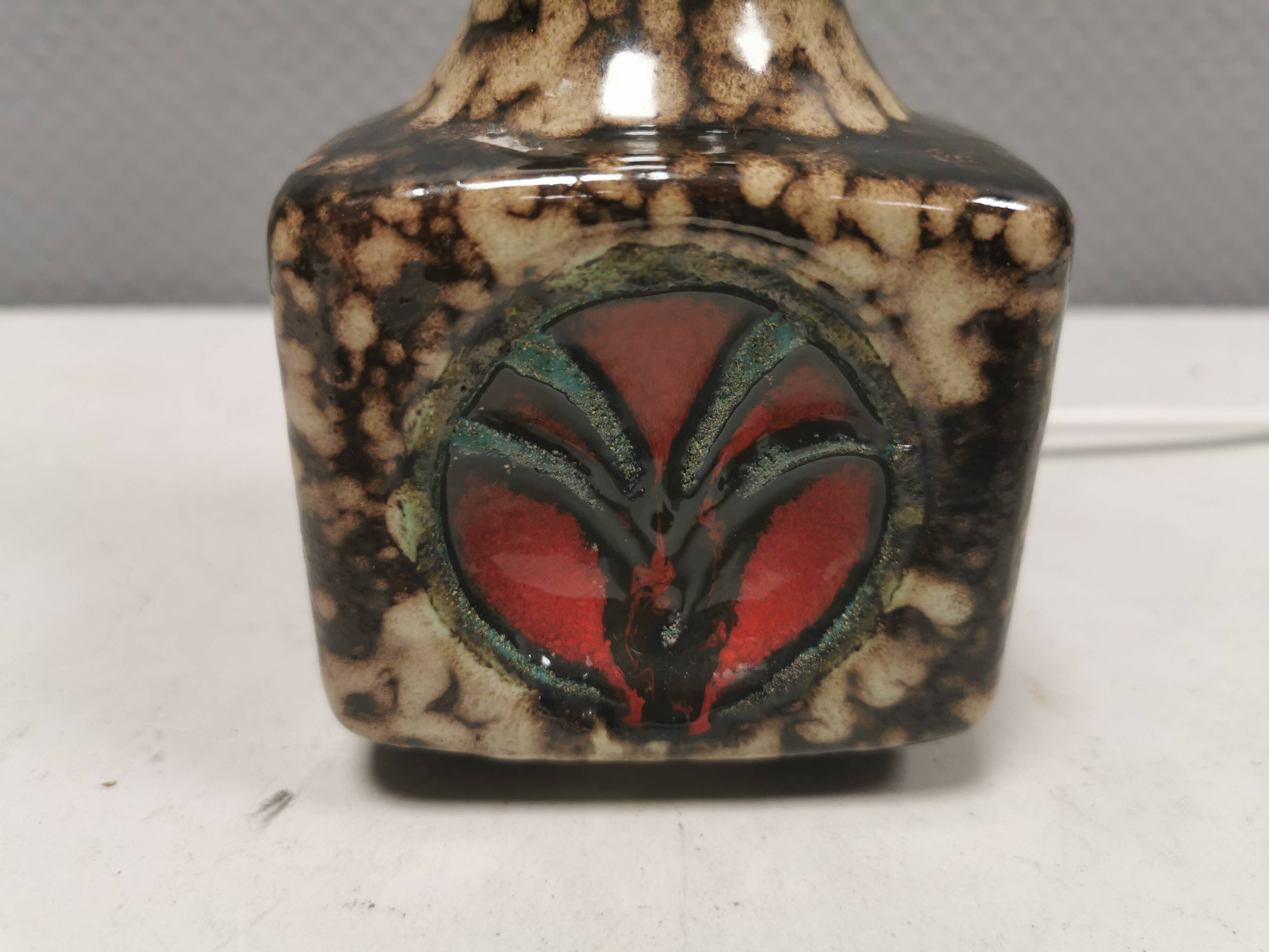 Small delicious ceramic table lamp, Danish and estimated from the 1970s.