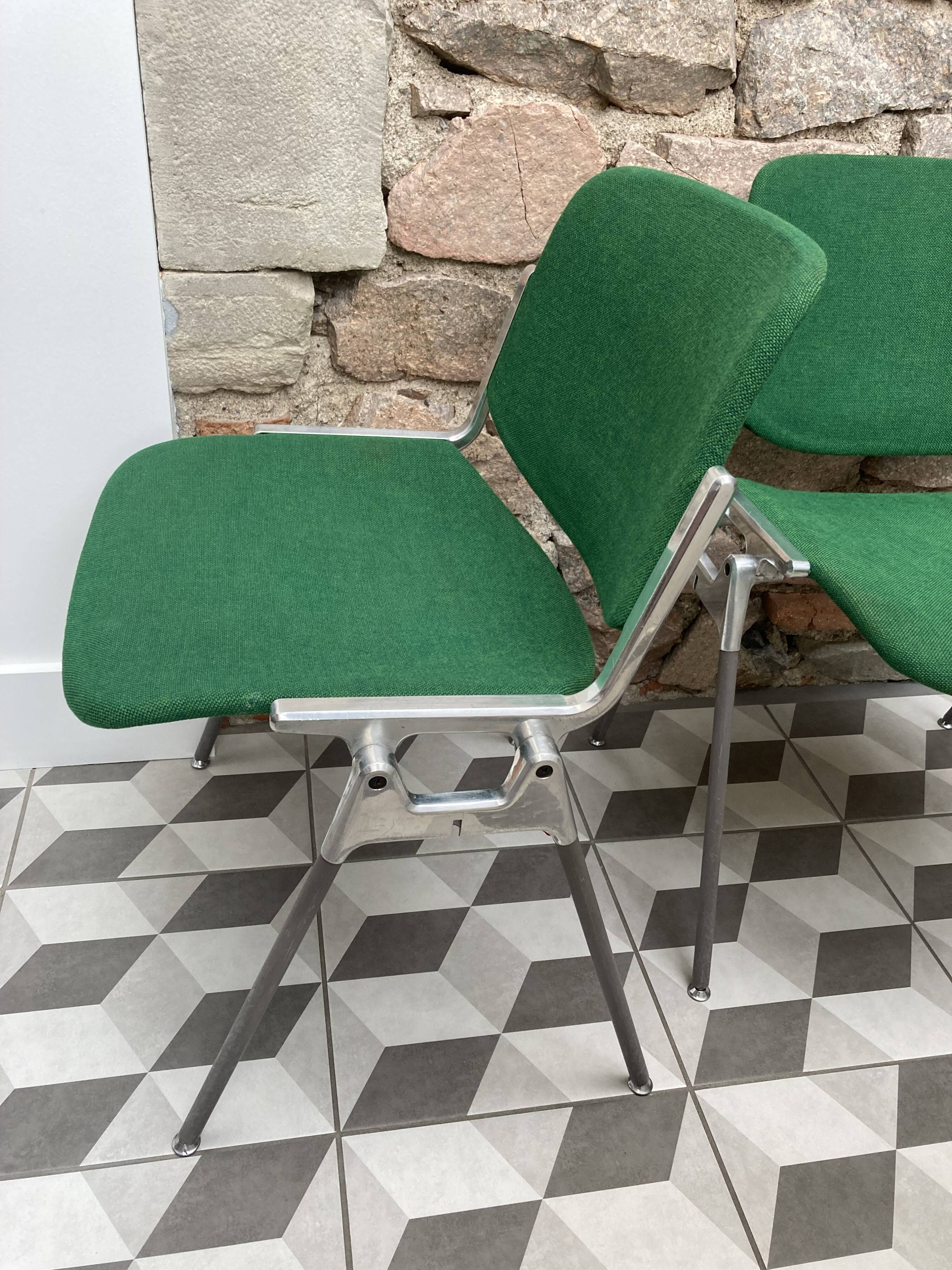 Pair of green DSC 106 chairs by Giancarlo Piretti