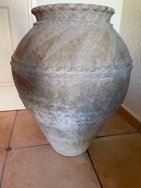 Ancient terracotta pottery jar