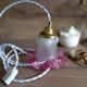 Lampe baladeuse en verre juponné vieux rose