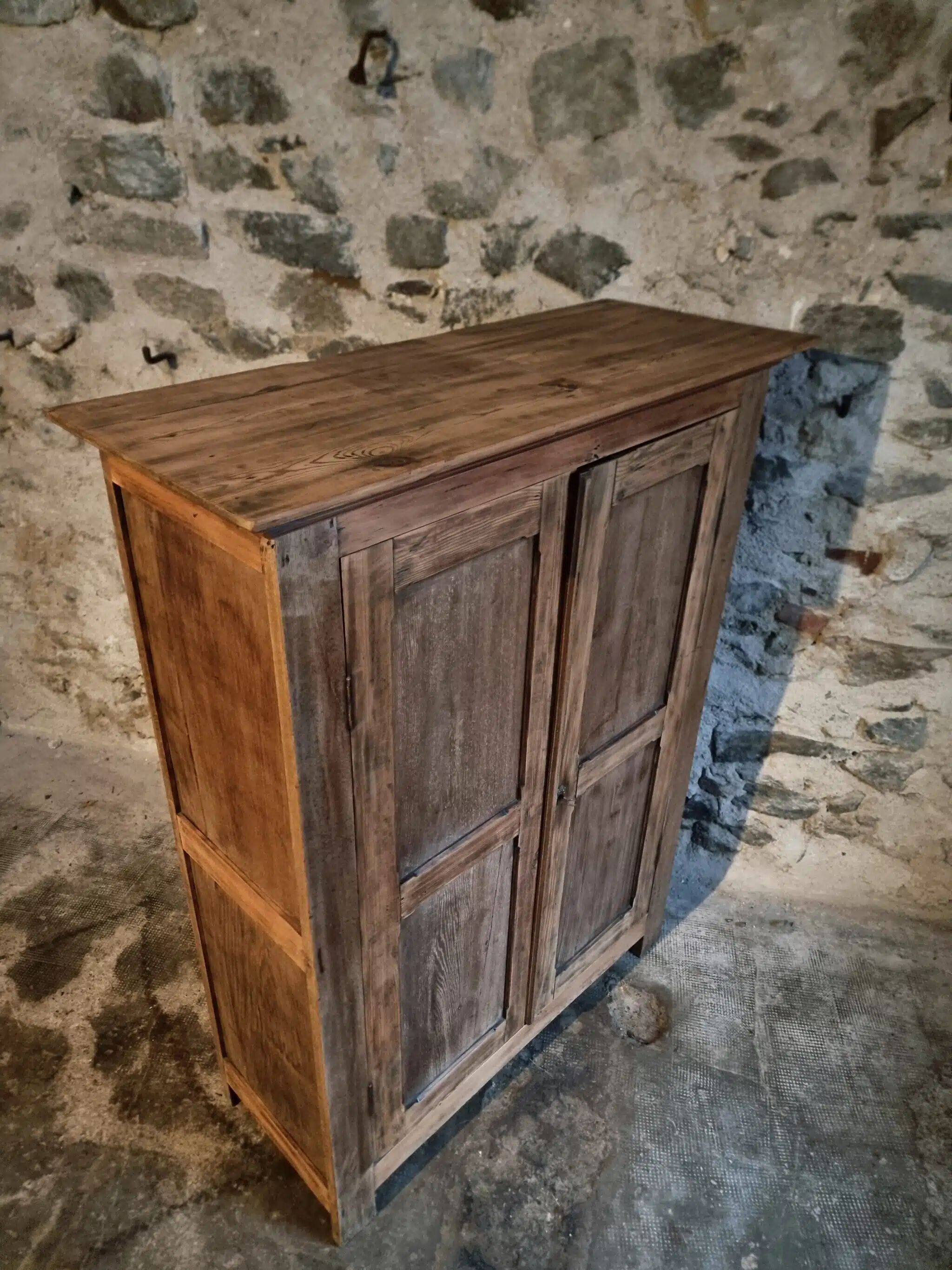 Antique French wardrobe in oak and pine, late 19th century.