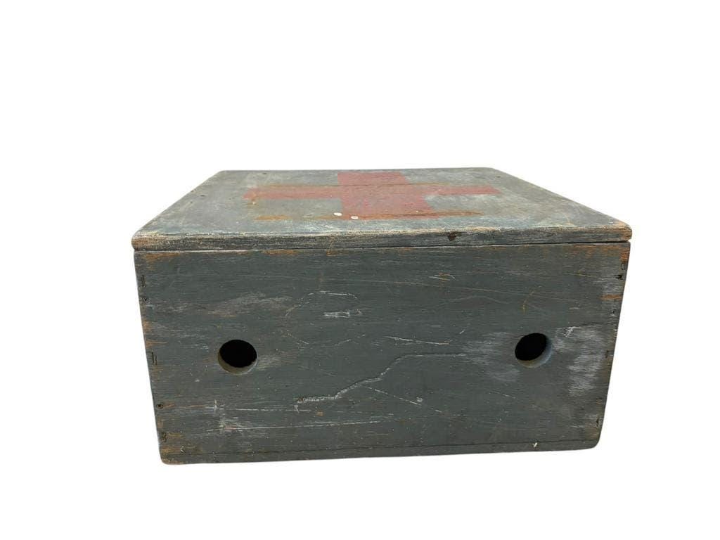 Vintage grey wooden chest with red cross 'first aid'