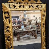 Large italian mirror in carved and gilded wood