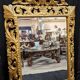Large Italian mirror in carved and gilded wood
