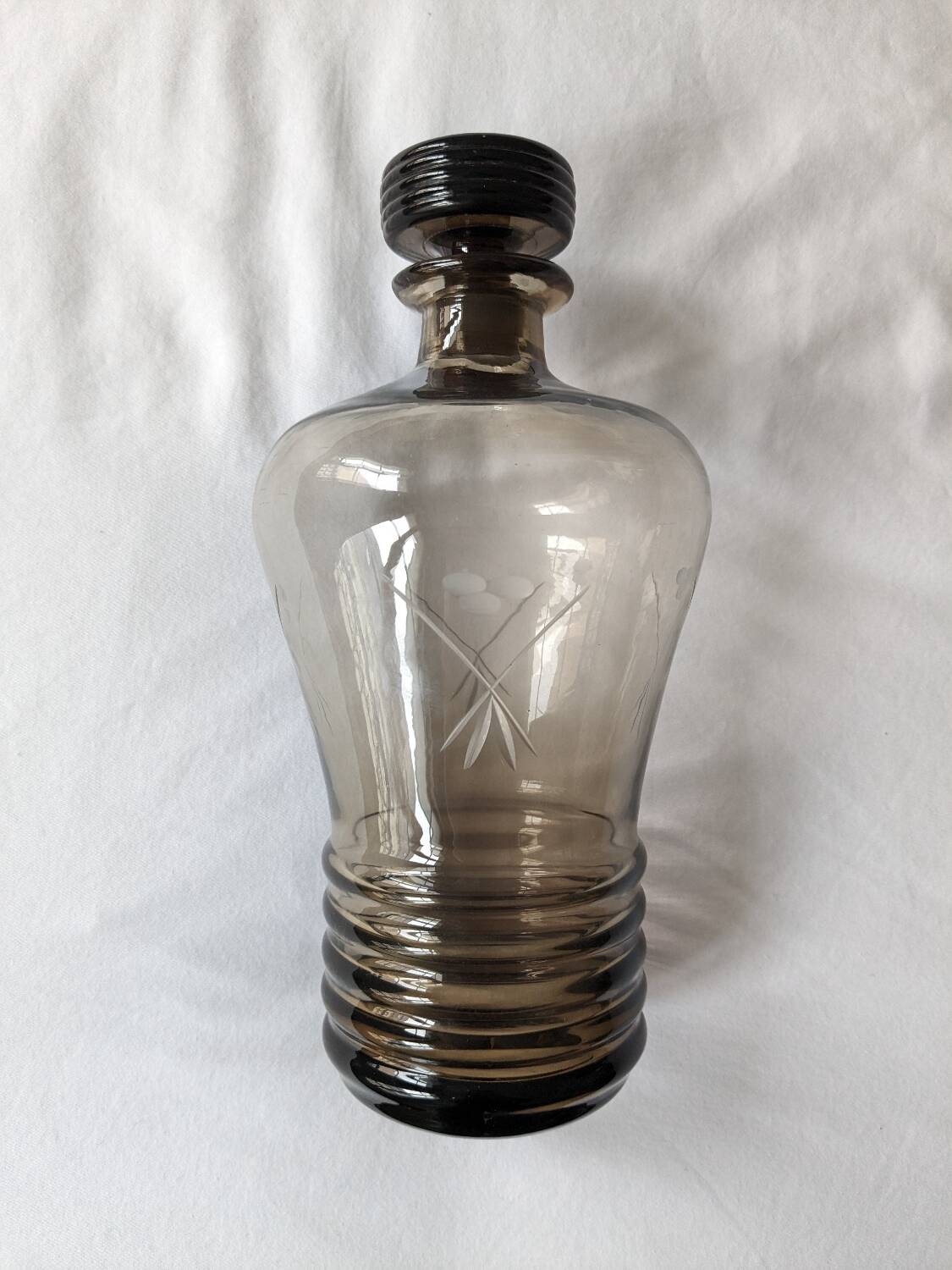 Engraved smoked glass carafe