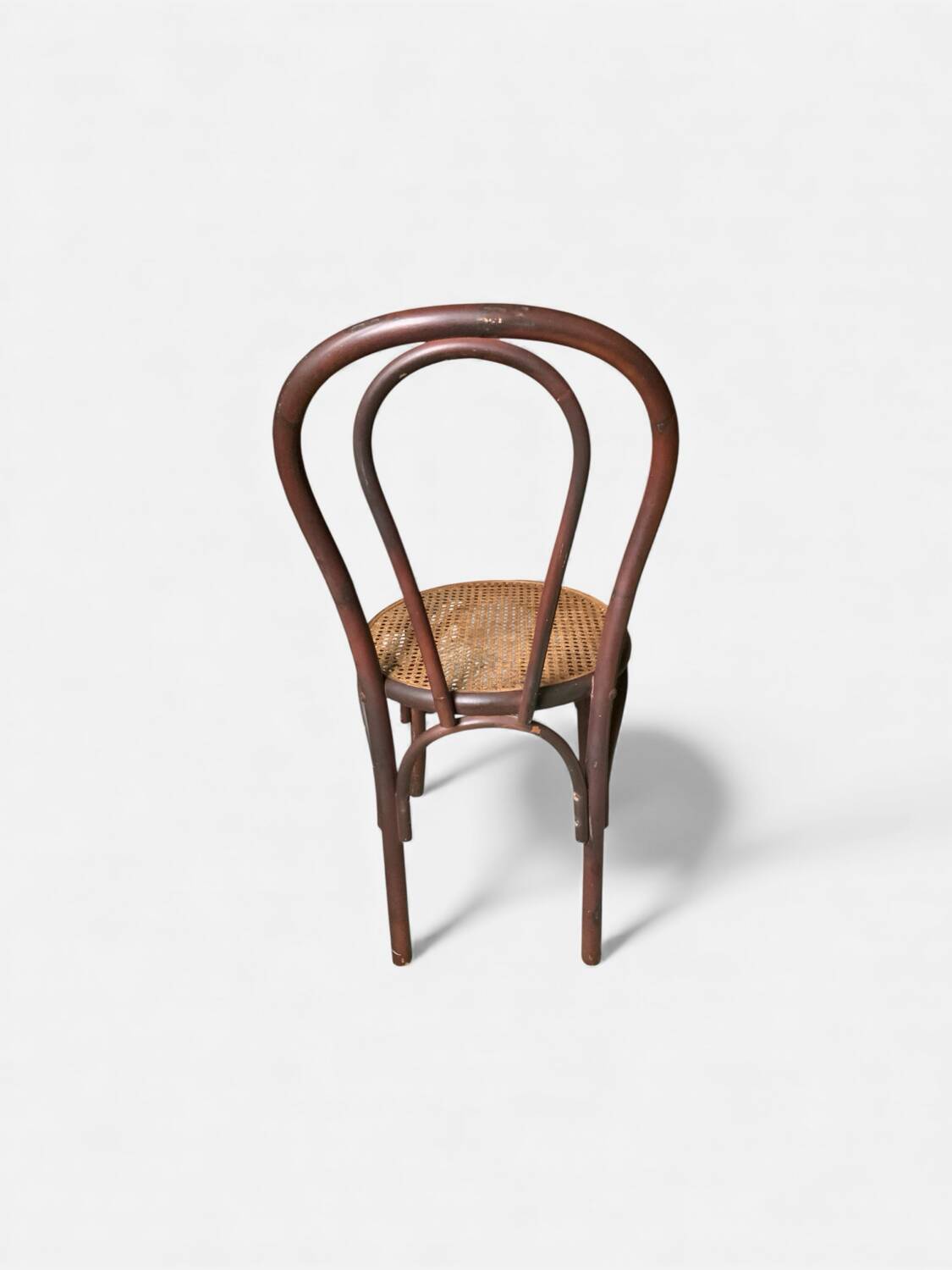 Vintage bistro chair in bent beech, caned seat – Thonet spirit