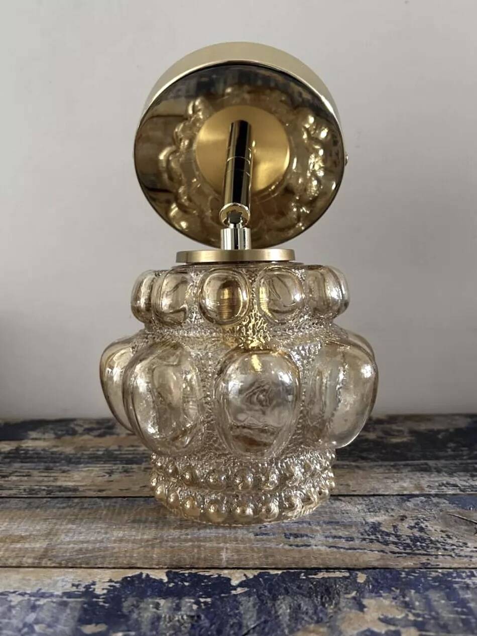 Gold tilting wall light