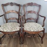 Pair of Provencal armchairs in brown wood and floral fabric