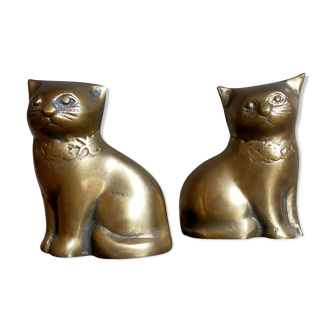 Couple de chats assis en laiton