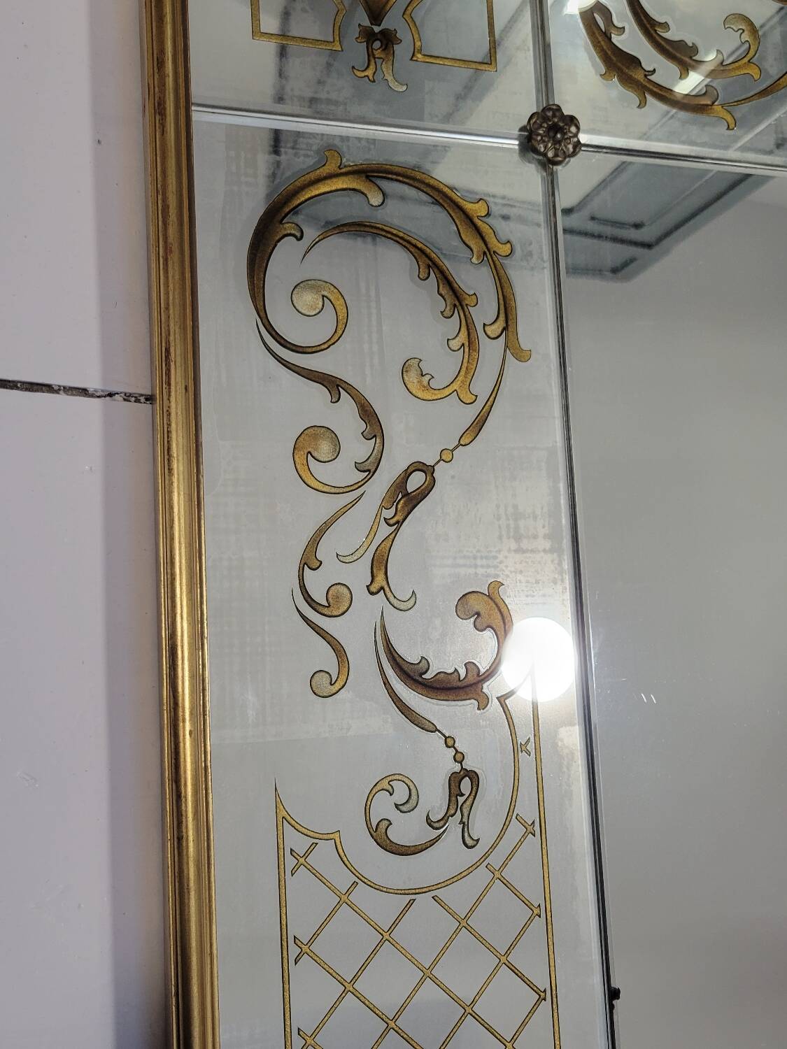 Eglomise brasserie mirror, late 19th century