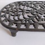 Large vintage black cast iron trivet