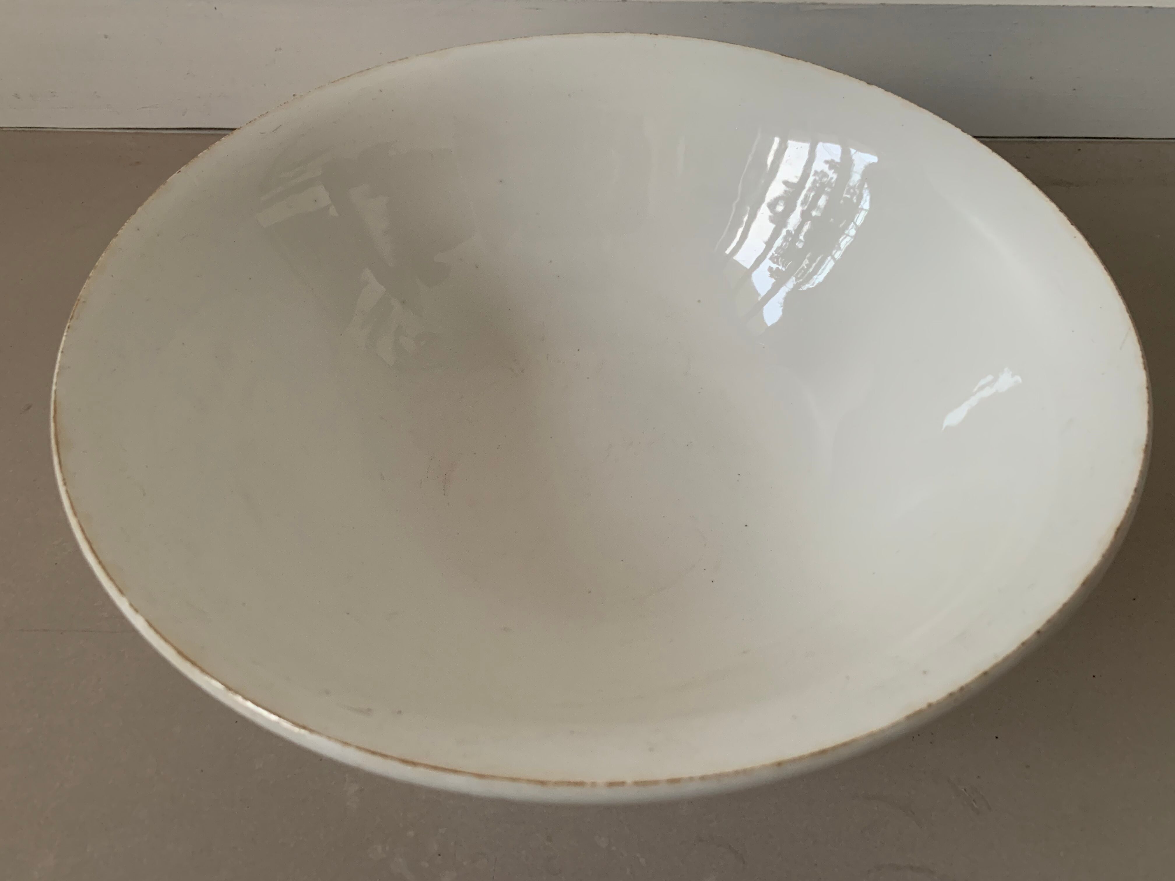 Old white salad bowl