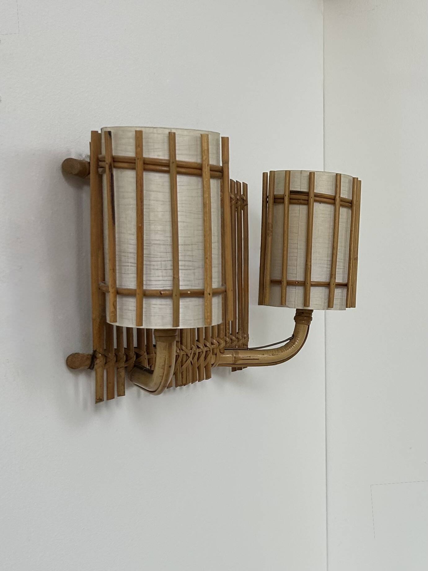 Double vintage wall light in rattan, France, 1950.