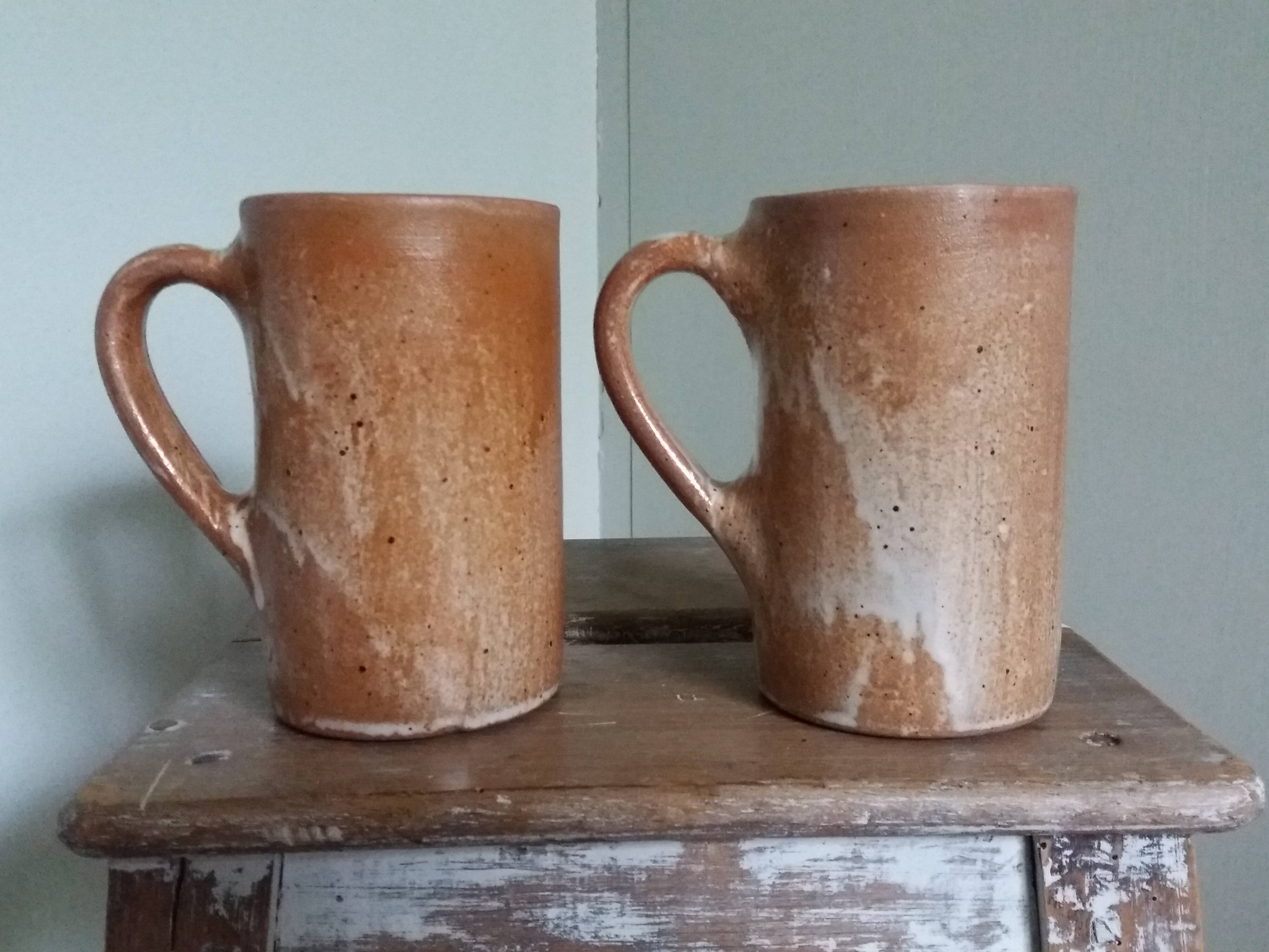 Enamelled stoneware mugs