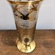Glass vase with gold bird decoration