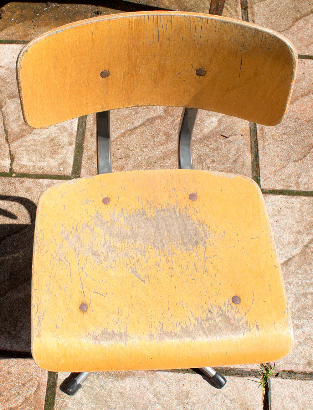 Old metal and wood school chair