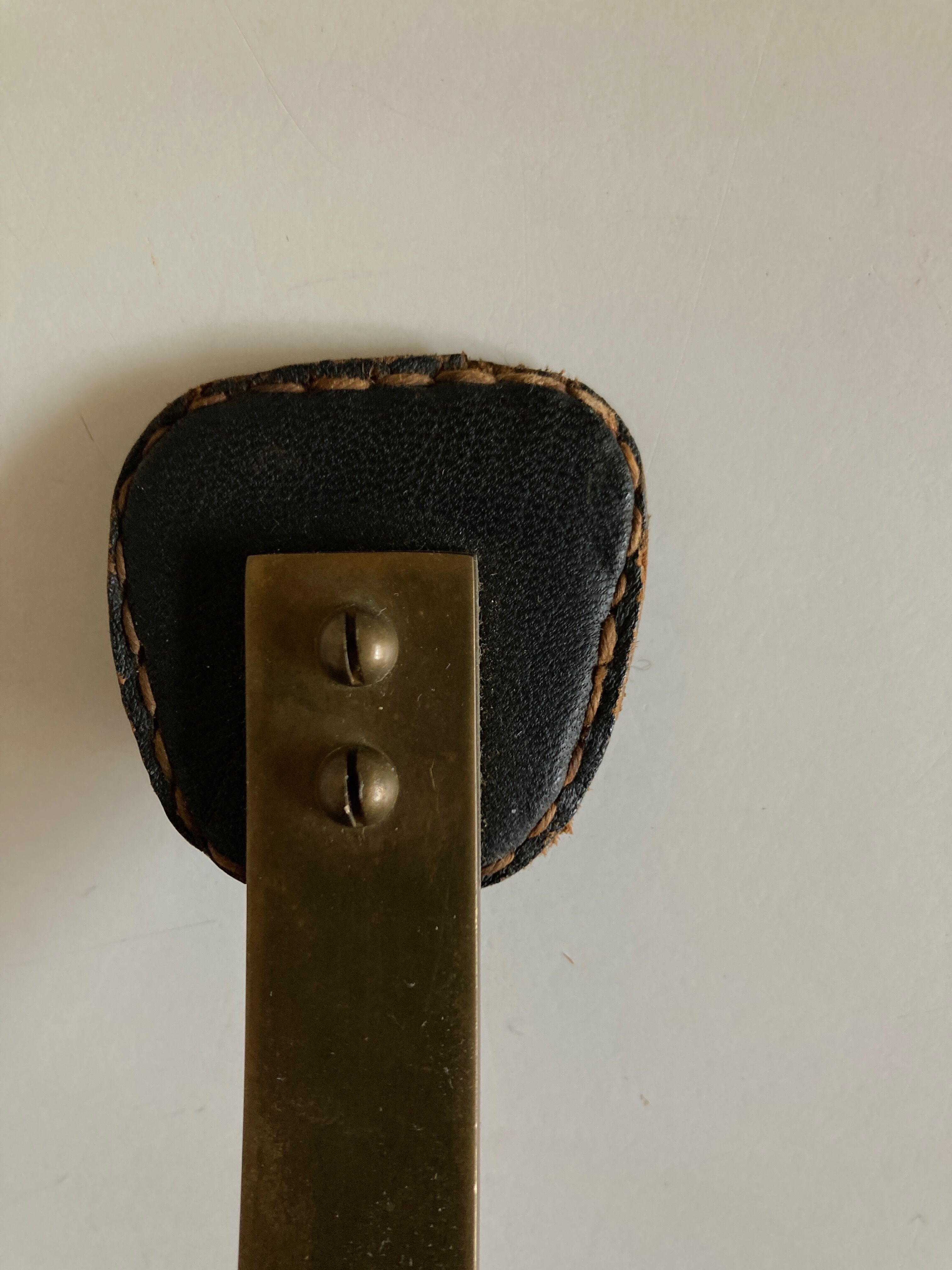 Adnet hook in bronze and leather 1950
