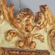 Miroir en bois de mélèze sculpté et doré