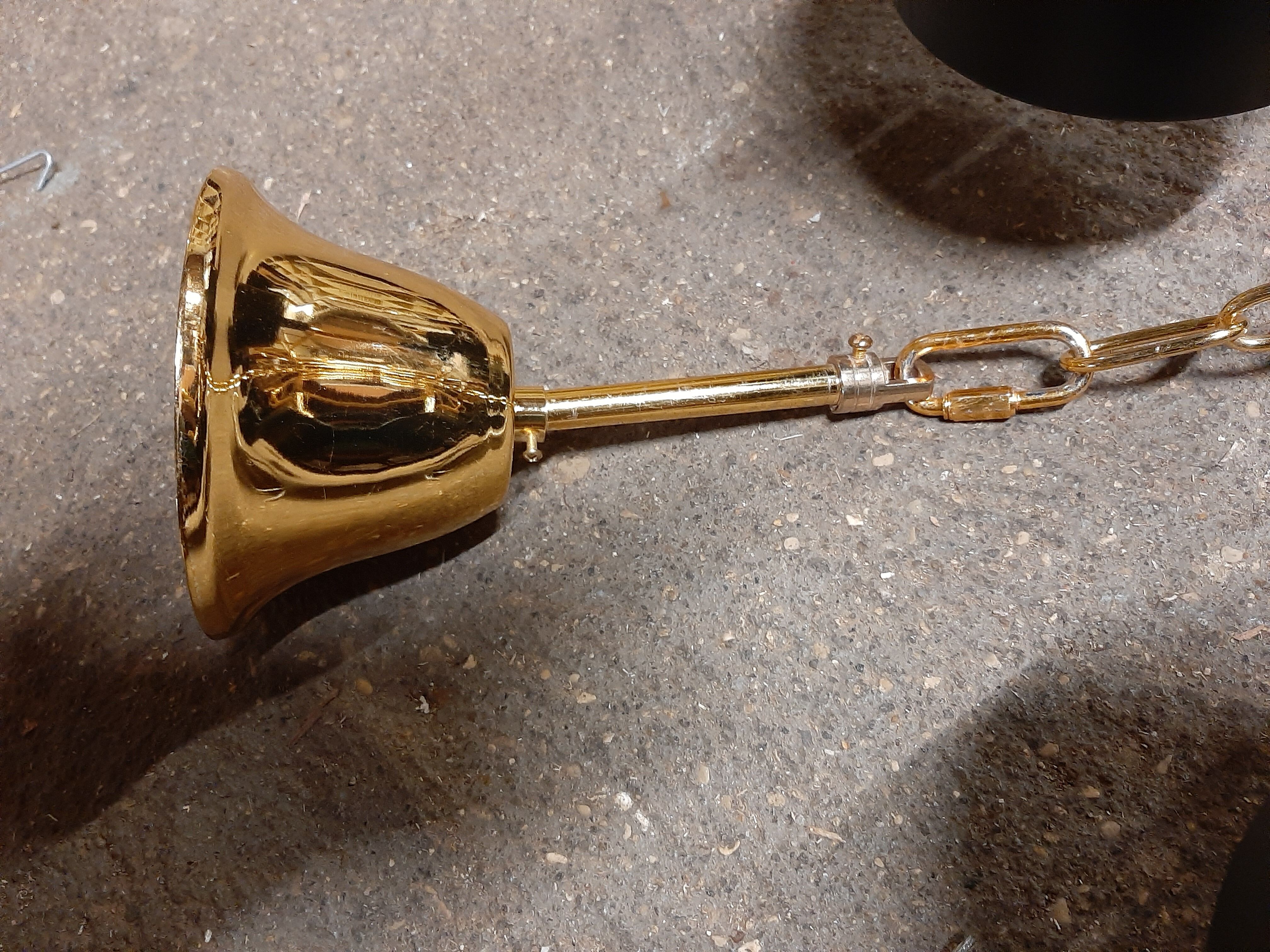 Black chandelier and gilded metal