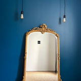 Antique mirror with pediments 141cm/80cm gilded with gold leaf, beveled ice